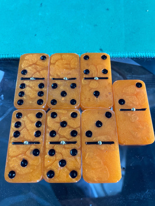 orange and black dominos—double 6/9/12 are available